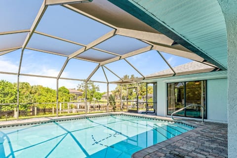3BR Coastal Oasis: Waterfront Home with Pool