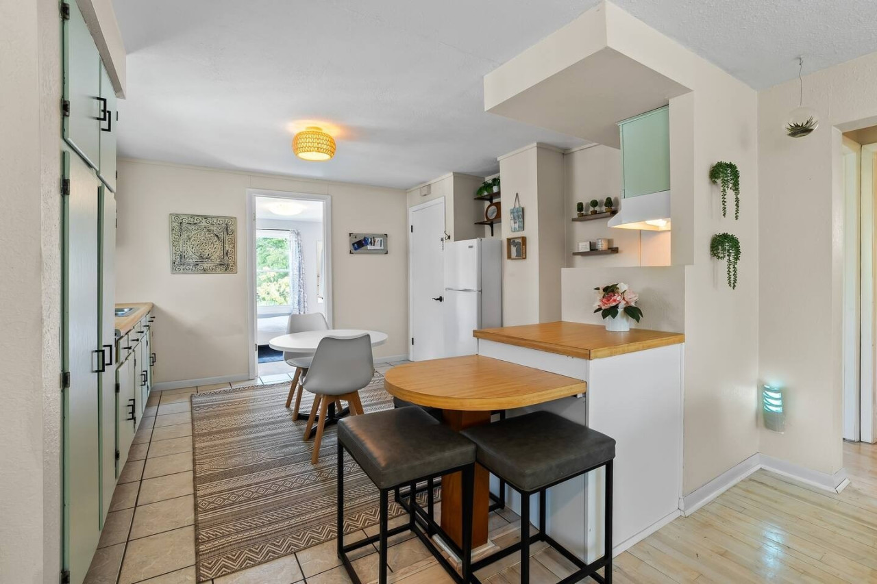 Start your day in this cozy breakfast nook, perfect for a morning coffee.