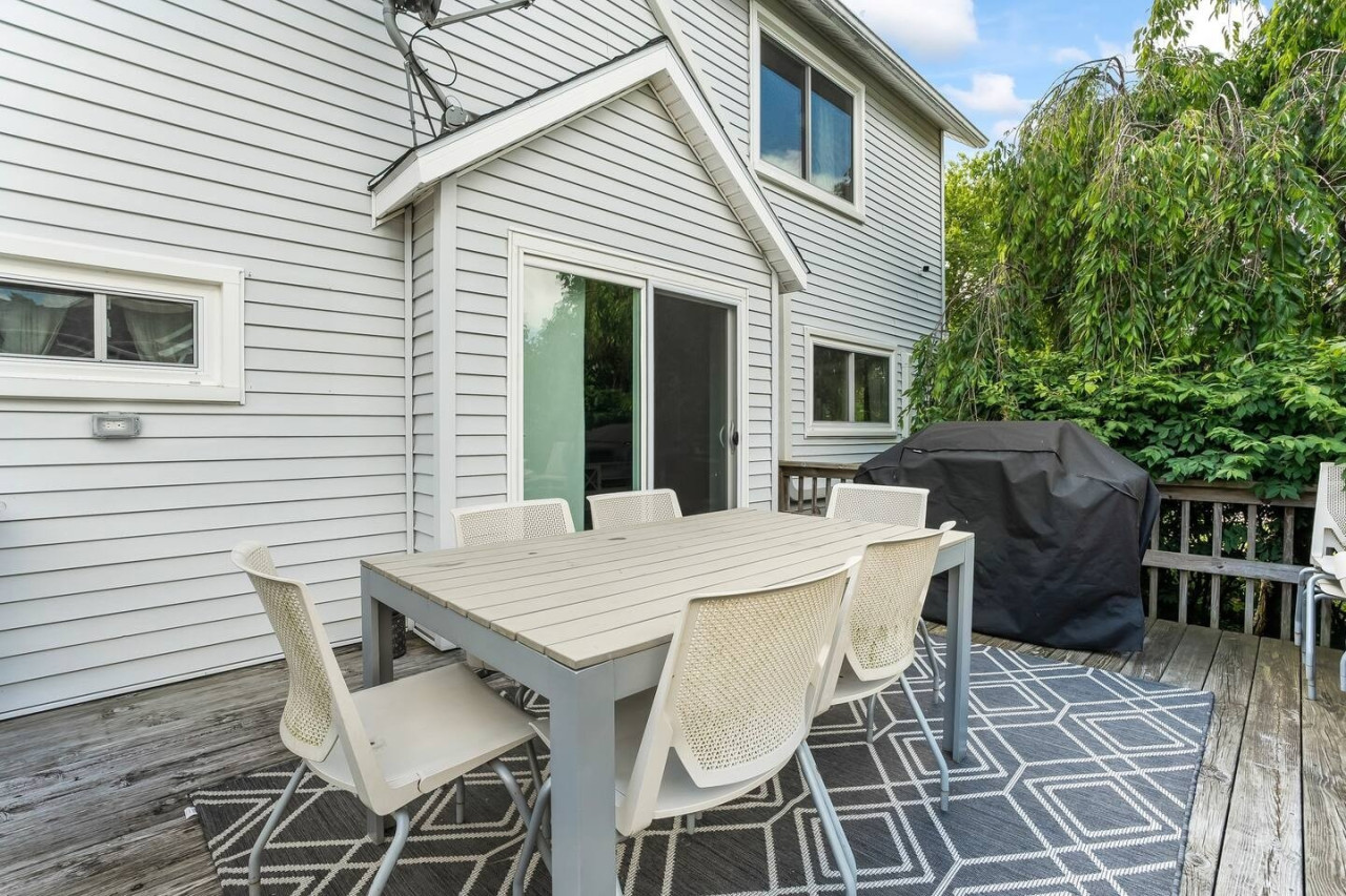 Enjoy al fresco dining on the patio, with a spacious dining area and a grill for the perfect outdoor meal.