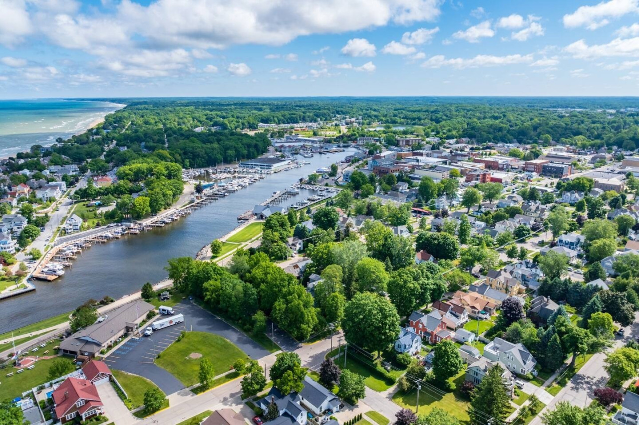 Get a bird’s-eye view of the entire property with Lake Michigan in the distance, creating a scenic and relaxing setting for your stay