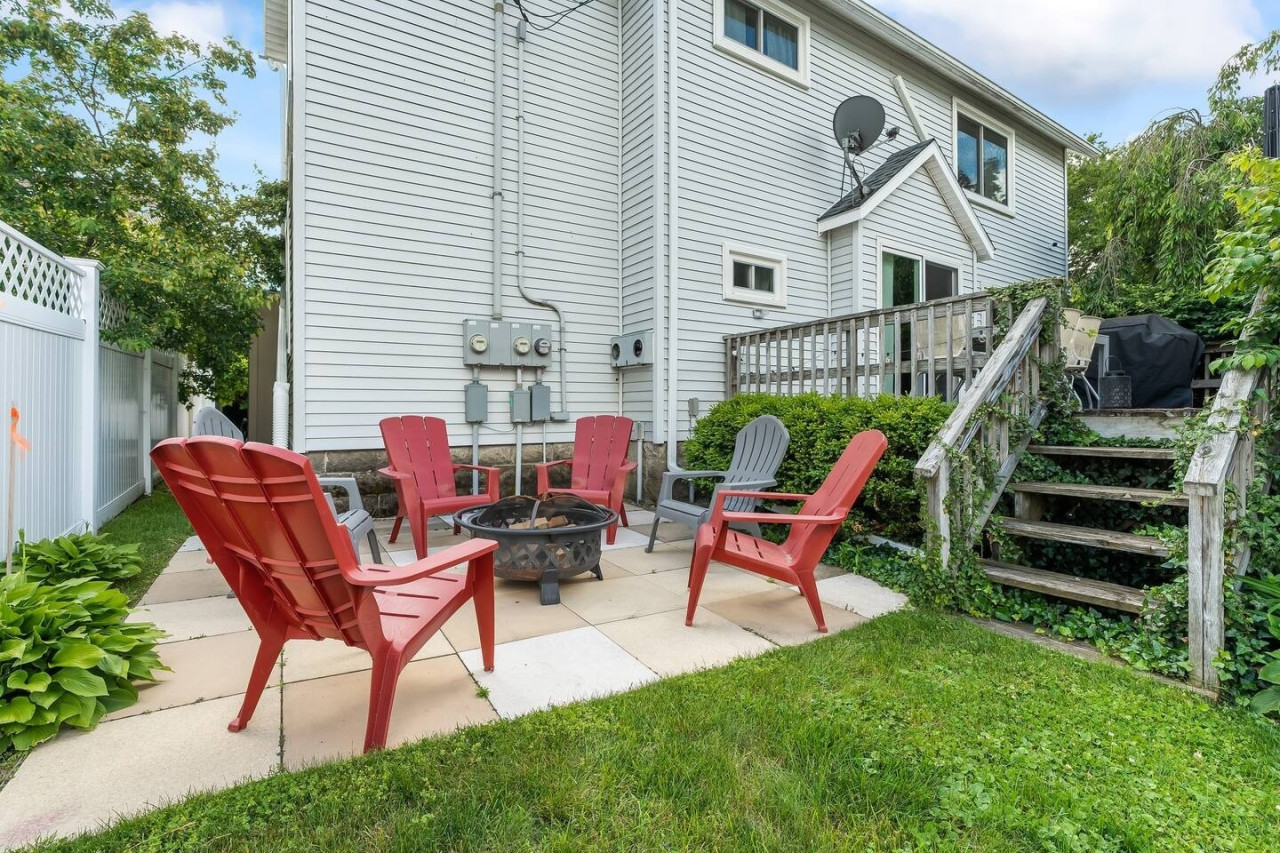 Relax around the firepit in the backyard, perfect for cozy evenings, warm conversations, and making memories under the stars.