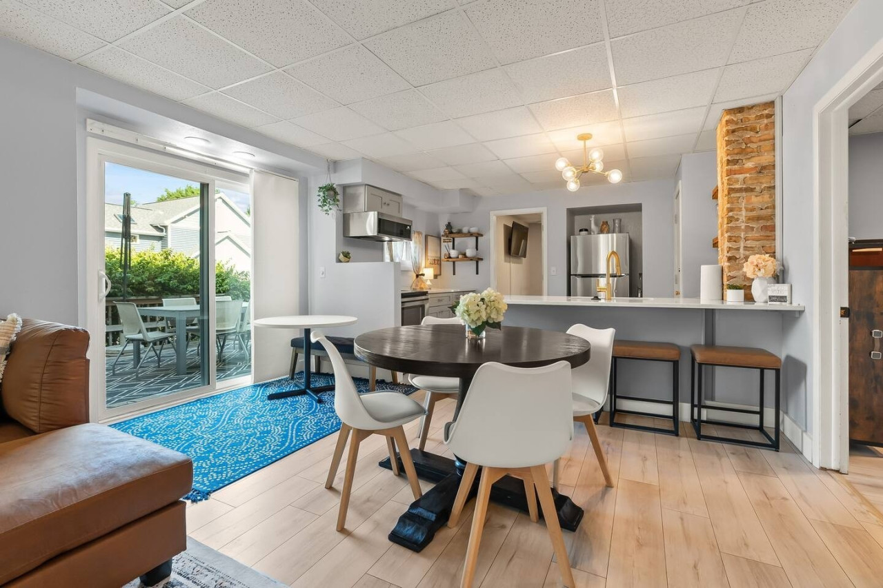 Whether for meals or casual bites, this dining area and breakfast bar offer a welcoming space to enjoy food and good company.