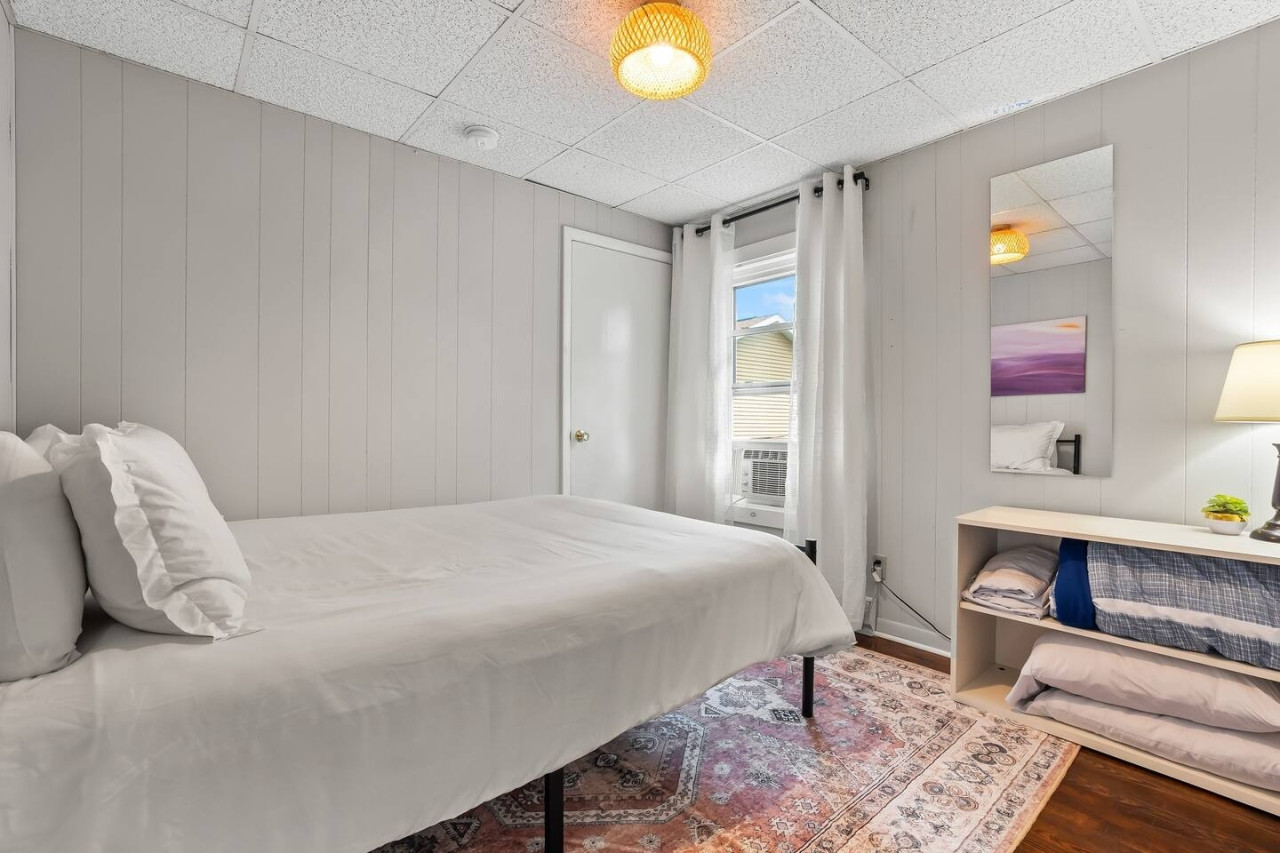 Cozy and inviting, this bedroom offers a peaceful space to relax and get a good night’s sleep after a day of adventure.