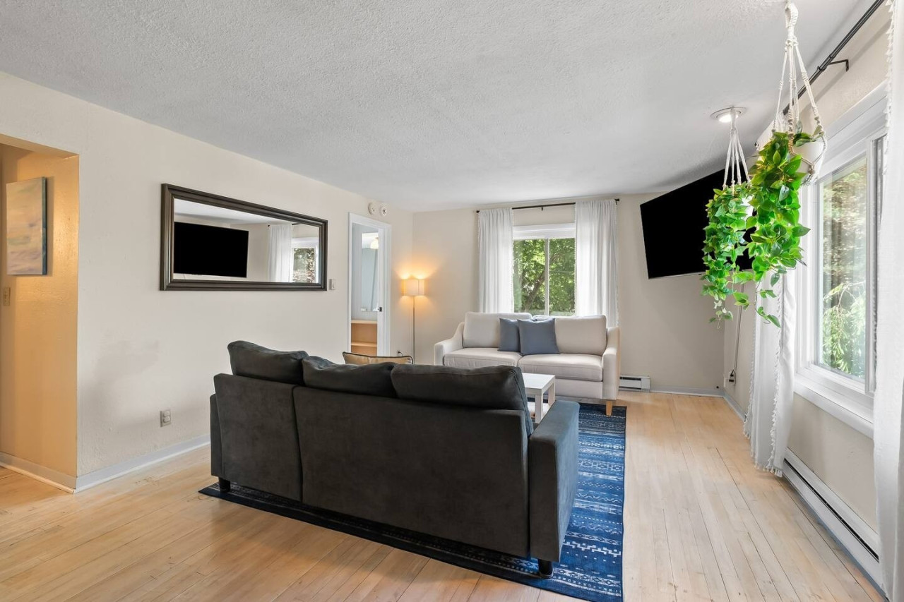 Kick back on the two small couches and enjoy your favorite shows on the smart TV in this comfortable living room.