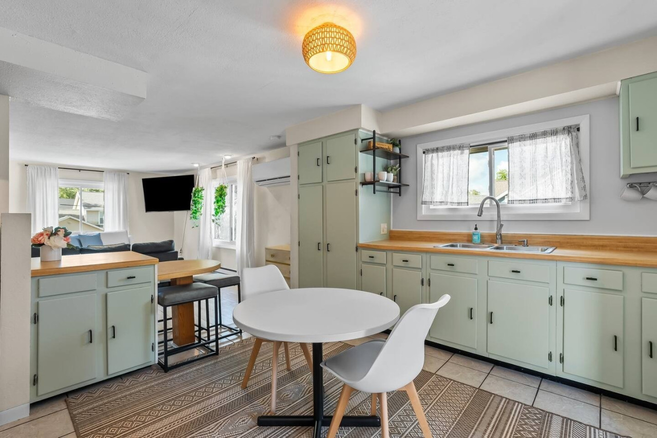 Relax in this cozy dining space, perfect for casual meals or morning coffee.