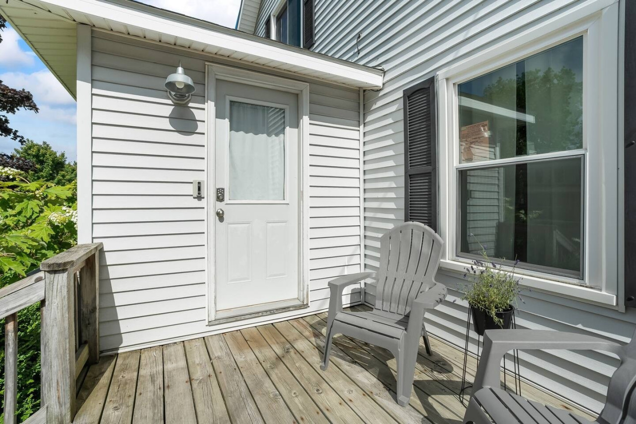 Sit back and relax on the front porch, the perfect spot to enjoy the fresh air and take in the peaceful surroundings