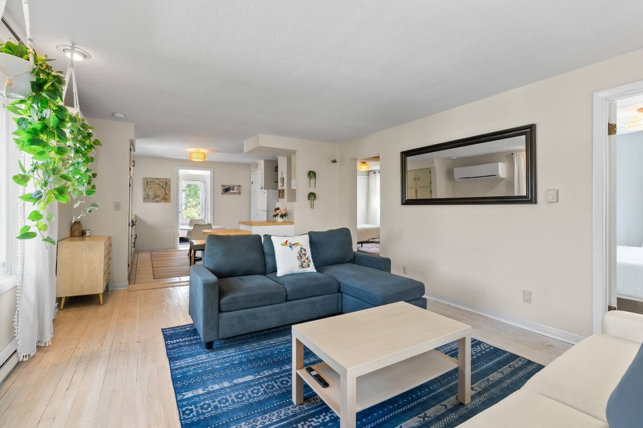 Relax and unwind in the cozy living room, a perfect spot for quality time after a day of exploring.