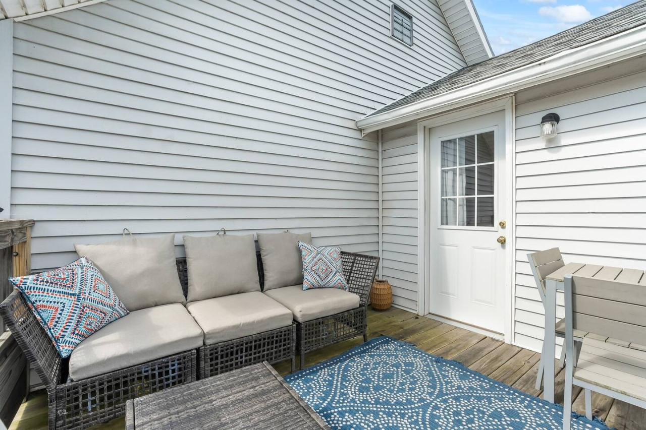 Unwind in this peaceful terrace lounge, perfect for relaxing and soaking in the fresh air.