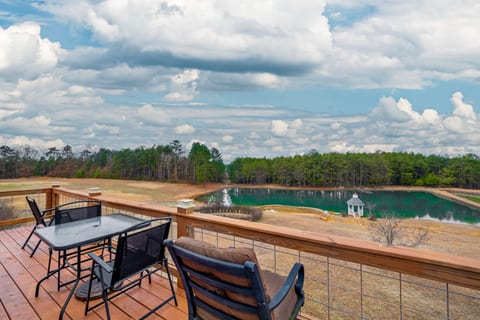 Start your morning with coffee on the deck, overlooking the pond and cozy outdoor seating!