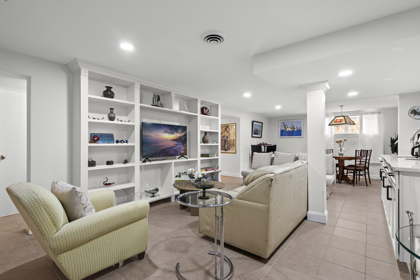 "Relax and recharge in the cozy living room, featuring a full sleeper sofa and Smart TV for a comfortable stay.