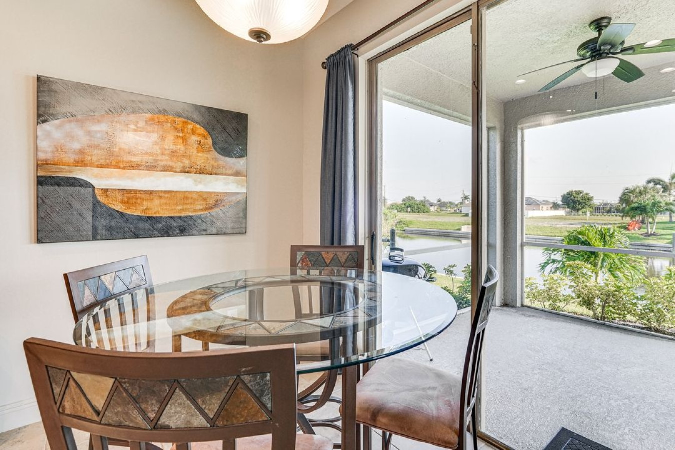 Enjoy meals with a view! This dining area offers the perfect setting to gather, dine, and take in the beautiful canal scenery.