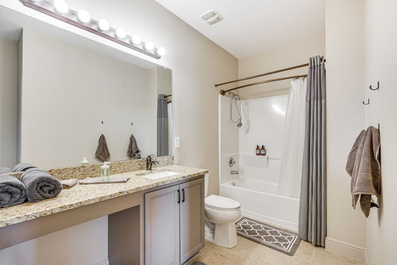 Bright and comfortable, this bathroom offers a relaxing place to start and end your day.