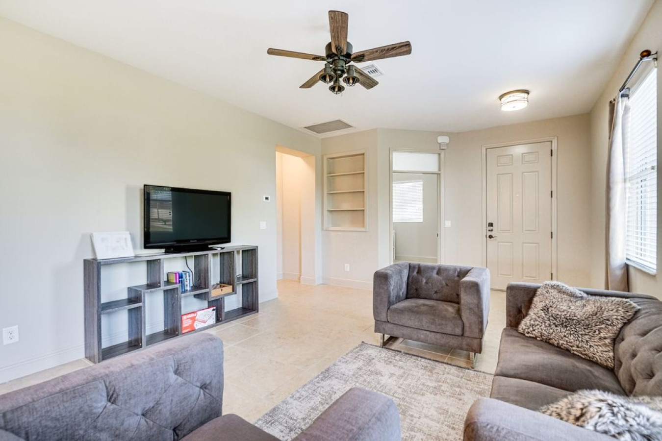 Cozy and inviting—this den is the perfect place to kick back and unwind with your favorite entertainment.