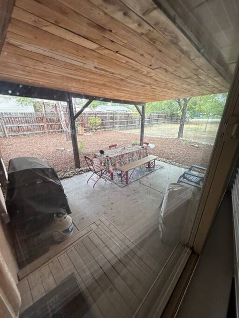 Backyard patio area. Bbq grill and fuel provided, hose, shed for bike storage and outdoor seating