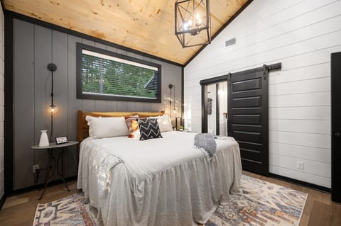 Escape away to the luxurious master bedroom