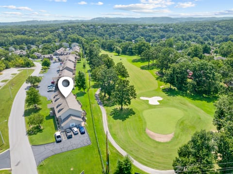 Your Branson getaway—ground-floor condo with front-row views of Pointe Royale’s 7th hole.