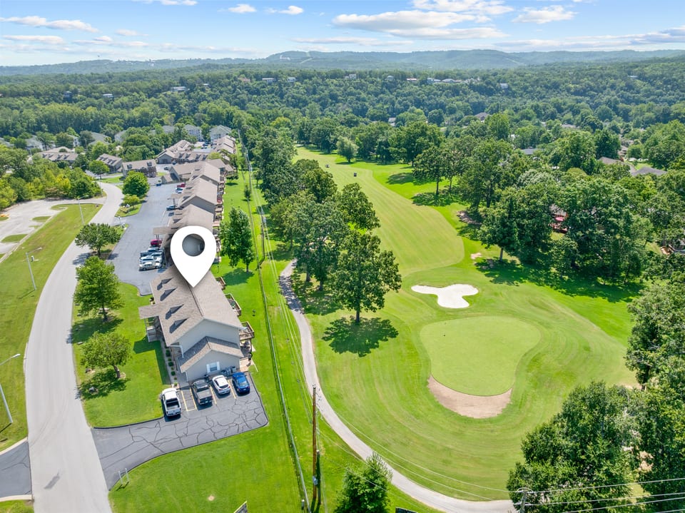 Your Branson getaway—ground-floor condo with front-row views of Pointe Royale’s 7th hole.