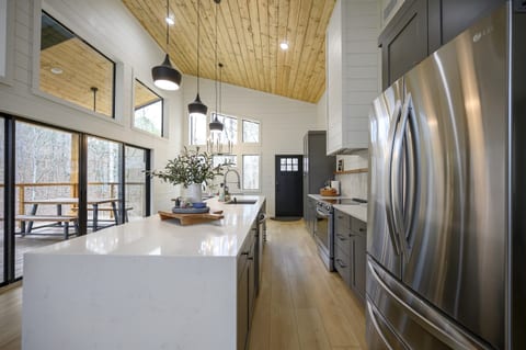 A culinary dream: our kitchen island with its stunning waterfall countertop.