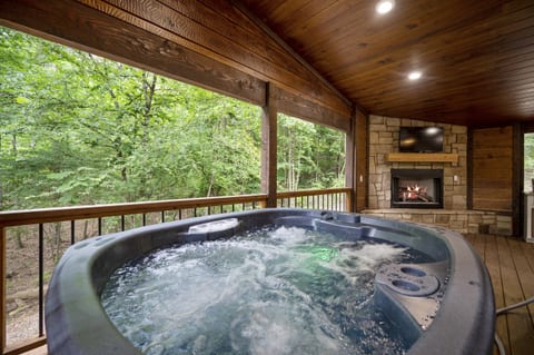 "Melt away your cares in the soothing warmth of our secluded hot tub under the stars."