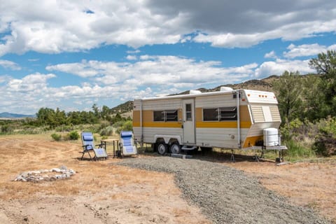 Sun, Wind, Creek Vintage Camper