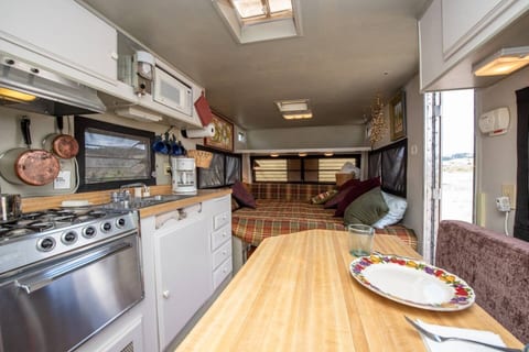 Sun, Wind, Creek Vintage Camper