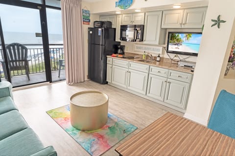 - Seamless blend of comfort and convenience in this beautifully designed space -Enjoy a fully equipped kitchen with modern appliances while staying connected to the oceanfront views - Perfect place to cook, dine, relax all in one open and inviting layout