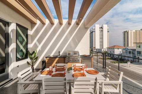 Balcony seating with summer kitchen for fresh ocean breezes