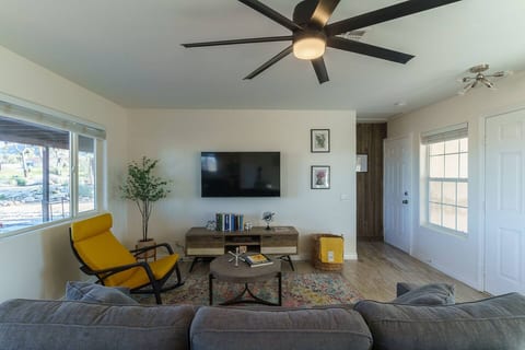 A comfy couch and a rocking chair.