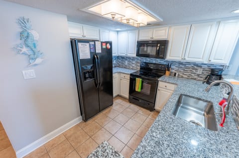 Large Kitchen Area with Full Sized Appliances