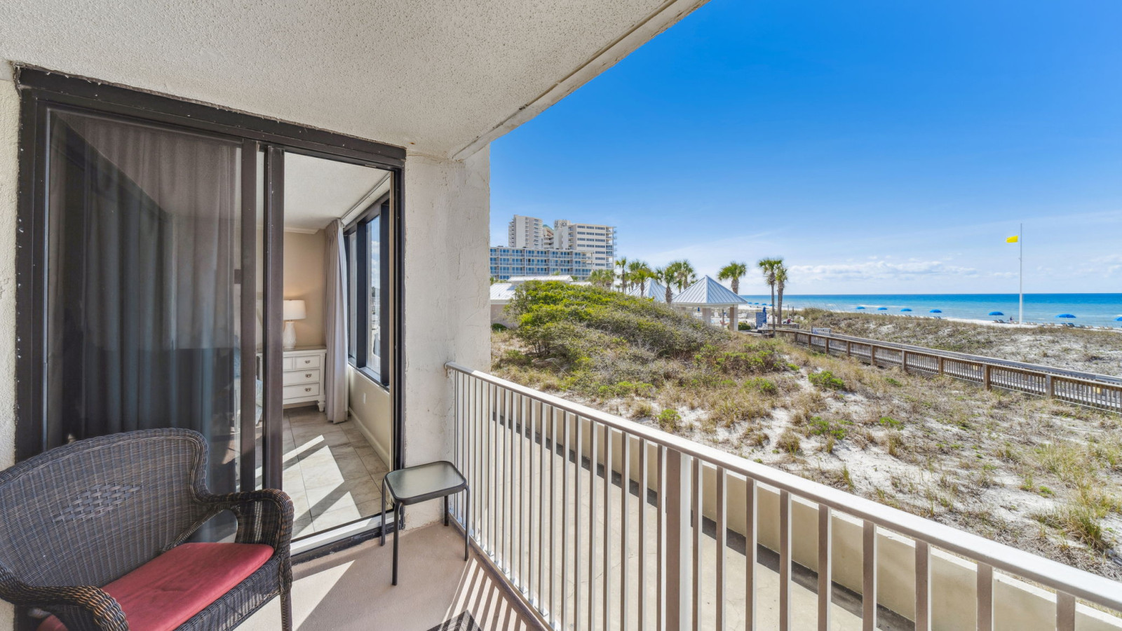 Enjoy direct Gulf views from your private balcony, steps from the sand and boardwalk—perfect for morning coffee or sunset relaxation.