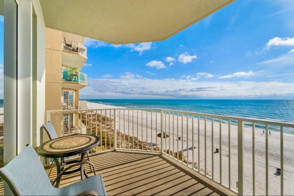 Sip your morning coffee or watch the sunset from your private balcony overlooking the sugar-white sands and emerald waters of the Gulf.