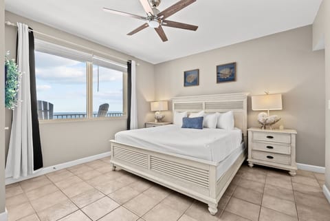 Wake up to Gulf views from the serene master bedroom featuring a plush king bed.