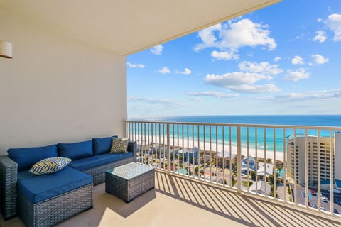 Private balcony with comfortable seating and breathtaking ocean views