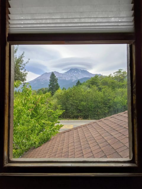 View out the Upstairs Bathroom Window.  It's a beautiful thing to be greeted by the mountain each morning!  These lenticular clouds are the source of some incredible stories in Mt. Shasta!