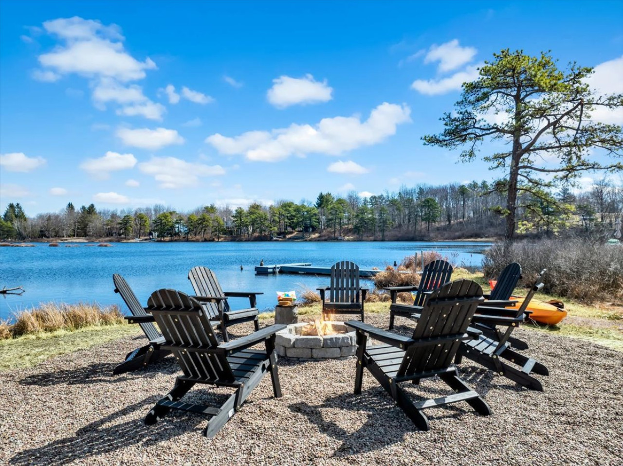 🔥 Unwind by the firepit, paddle across the lake with our kayaks, or relax on your private dock—all with stunning lake views! 🌅