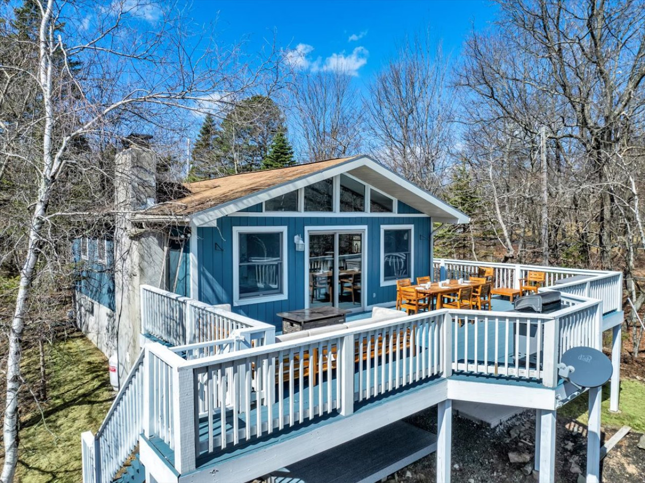Step outside onto the elevated deck, a perfect outdoor retreat designed for relaxation and entertainment.