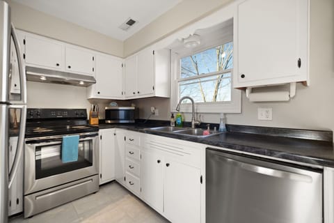 Bright kitchen with stainless appliances and ample counter space