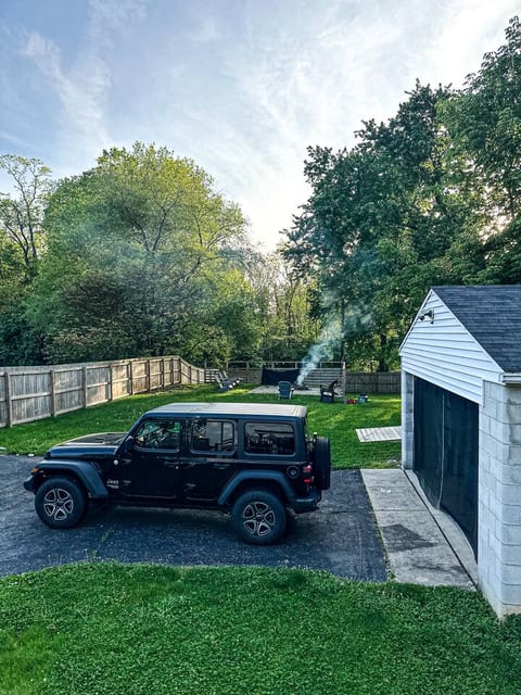 Park with ease and head straight to relaxation—our inviting backyard and firepit area is ready for you.