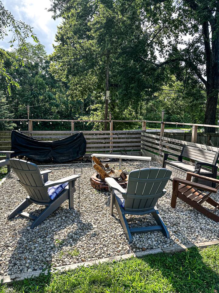 Kick back, relax, and enjoy fireside chats under the stars in this cozy outdoor retreat.