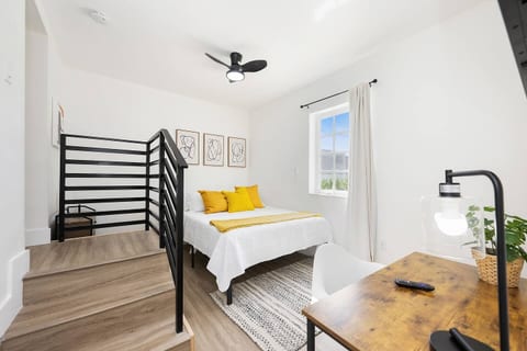Third bedroom with queen bed, full bathroom and dedicated work space