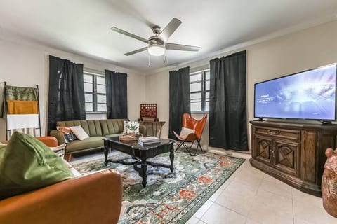 Livingroom with smart TV for streaming. Both sofas fold flat for additional sleeping areas