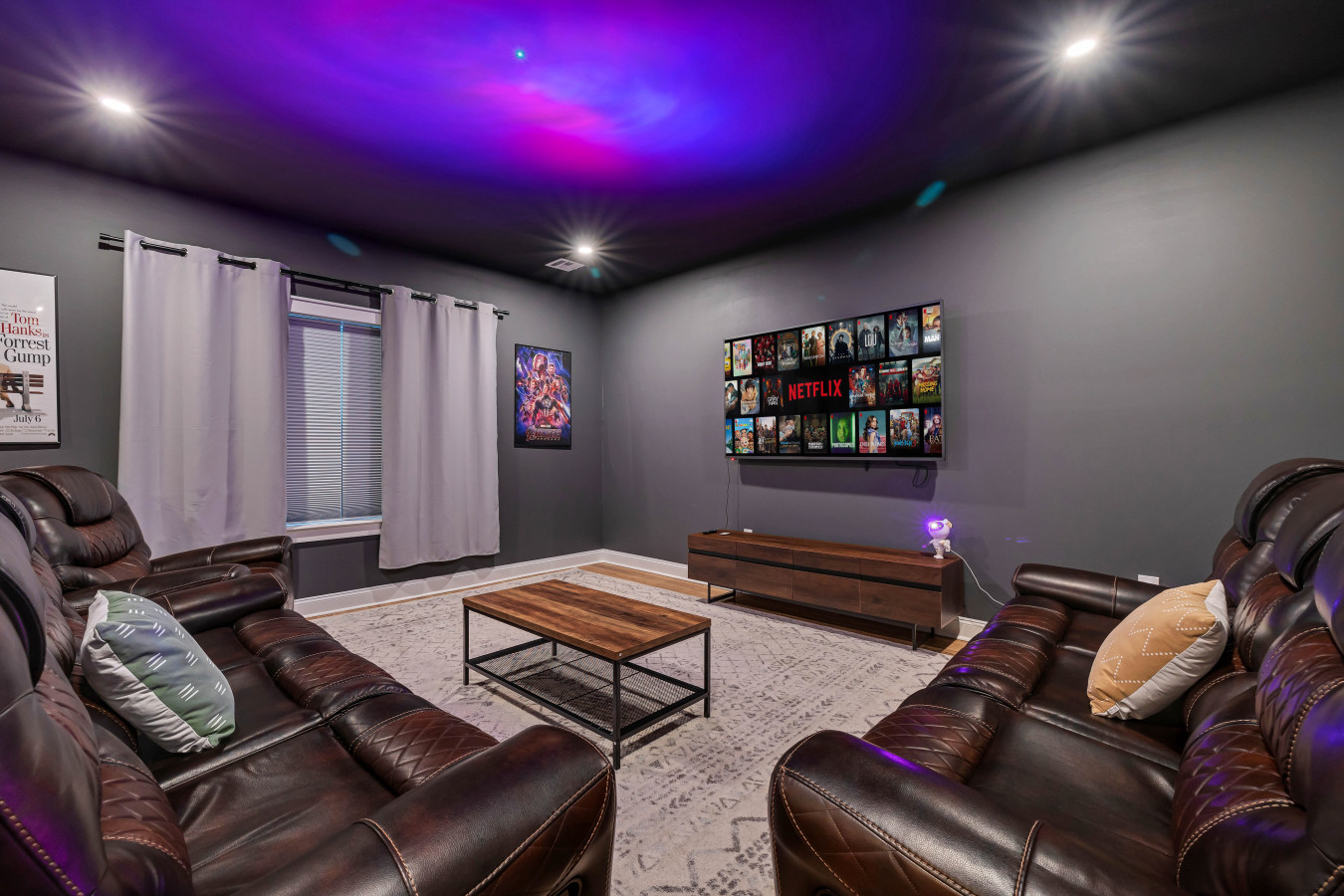 Ultimate Movie Night! 🎬🍿 Enjoy a cinematic experience in our theater room, featuring a massive 75” screen and two luxurious reclining leather sofas for maximum comfort. Sit back, relax, and immerse yourself in your favorite films!