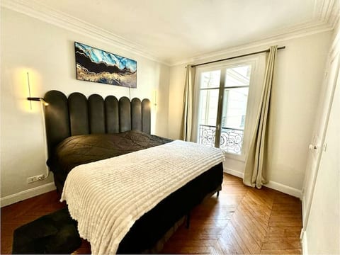 The bedroom features a king-size bed elevated for extra comfort. Convenient bedside controls allow you to turn off the lights without leaving the bed. Every detail is designed to create a calm and restful environment for a peaceful night’s sleep.