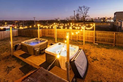 Backyard | Dual Hot Tubs | Evening Vibes | Shared Space
Soak under the stars in two private hot tubs surrounded by glowing bistro lights—your perfect spot to relax, recharge, and toast to a night in Nashville.