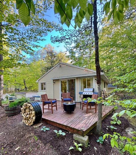 Oversized deck with seating area, bonfire pit and gas grill.