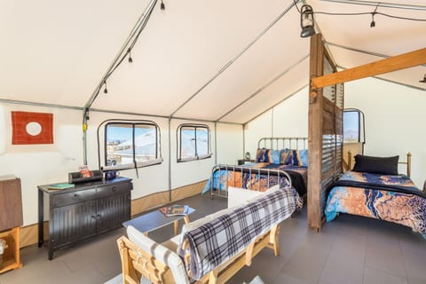 I spy a coffe-maker, dressers, AC and heating, and views from inside