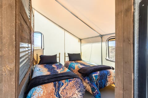 Two twin beds also fit inside your tent