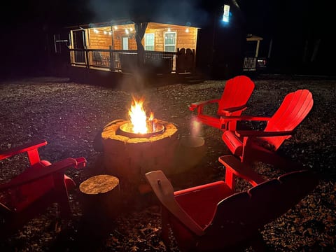 Beautiful Fall night fire pit off back porch. 
