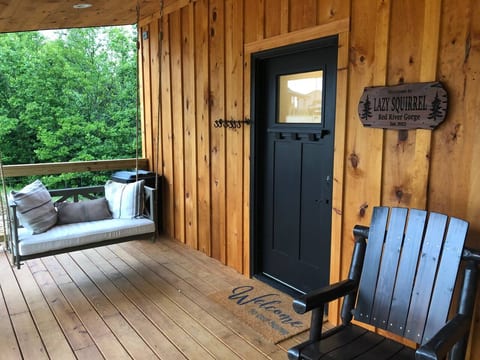 Enjoy your morning coffee on the Front porch swing with pillows or rocking chairs.