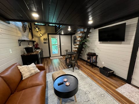 Luxury leather couch with footrests are a perfect end to a day of hiking. 